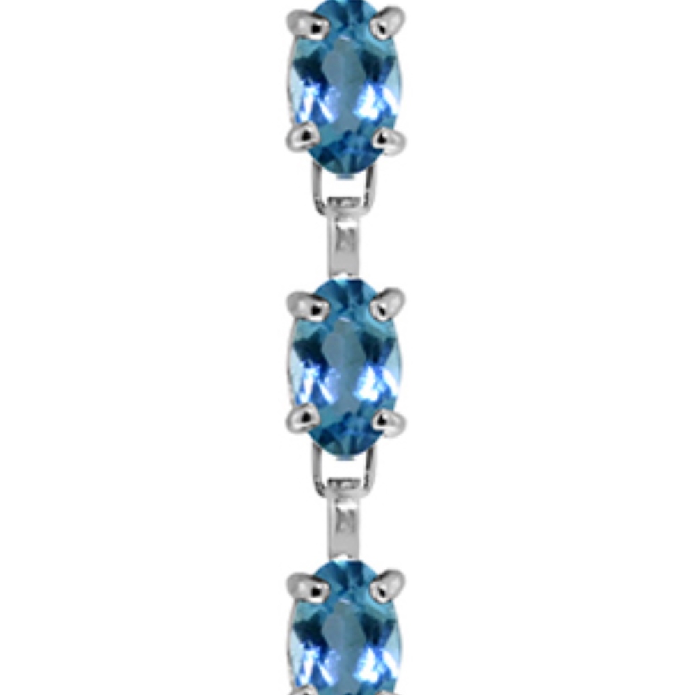 14K. SOLID GOLD TENNIS BRACELET WITH BLUE TOPAZ - Picture 2 of 2